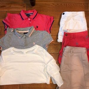 2 Polo shirts , white shirt , 2 shorts , a skirt.